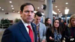 FILE - Then-Senator Marco Rubio speaks to reporters following a classified briefing on China, at the Capitol in Washington, Feb. 15, 2023.