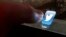 An illustration picture shows the log-on icon for the Website Twitter on an Ipad in Bordeaux, Southwestern France, January 30, 2013. REUTERS/Regis Duvignau (FRANCE - Tags: SCIENCE TECHNOLOGY BUSINESS) - RTR3D6NN