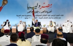 This photo posted on the official Facebook page of Egypt's presidential spokesman July 16, 2020, shows President Abdel Fattah al-Sissi (C) meeting with the Liyban tribal leaders during a conference in the capital Cairo.