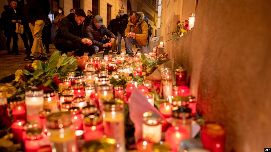 People light up candles outside Vienna's main synagogue near the site of the terrorist attack in Vienna, Austria on Nov. 4, 2020. 
