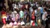 FILE PHOTO - Cambodian residents line up to vote in local elections at a polling station in Chak Angre Leu on the outskirts of Phnom Penh, Cambodia, Sunday, June 4, 2017. 