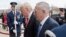 FILE - U.S. Defense Secretary Jim Mattis, right, and U.S. President Donald Trump walk into the Pentagon in Washington.