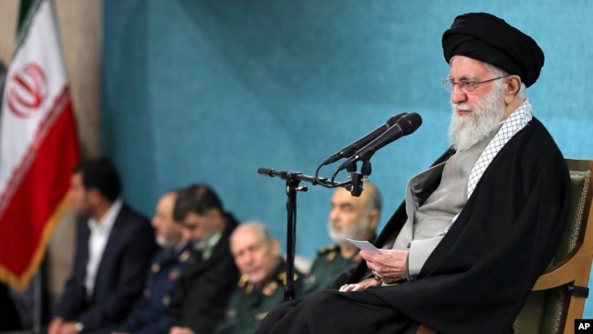 In this photo released by an official website of the office of Iranian Supreme Leader Ayatollah Ali Khamenei, he speaks in a ceremony meeting a group of officials in Tehran on March 8, 2025. Khamenei refused potential nuclear talks between Iran and the United States.