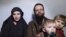 A still image from a video posted by the Taliban on social media on Dec. 19, 2016, shows American Caitlan Coleman speaking next to her Canadian husband, Joshua Boyle, and their two sons. 