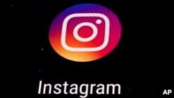 FILE - Instagram app logo is displayed on a mobile screen in Los Angeles. 