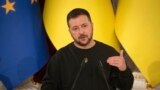 FILE - Ukrainian President Volodymyr Zelenskyy speaks during a joint press conference with European Council President Charles Michel and President of Moldova Maia Sandu in Kyiv, Ukraine, Nov. 21, 2023.
