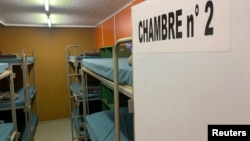 Bunk beds are seen in the atomic shelter underneath the civil protection building in Gollion, Switzerland, Dec. 12, 2024. 