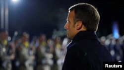 French President Emmanuel Macron reviews troops in the Aisne, France, Nov. 7, 2018. A coalition of 10 European militaries, a French-led initiative, was launched Wednesday.