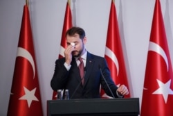FILE - Turkish Finance Minister Berat Albayrak speaks during a conference to ease investor concerns about Turkey's economic policy, in Istanbul, Nov. 8, 2020.