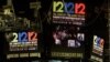 Signage for the "12-12-12" concert is displayed on the Madison Square Garden jumbotron in New York, December 11, 2012.