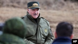 (FILE) Belarus President Alexander Lukashenko speaks to military personnel during his visit to Oshmyany District, Grodno region of Belarus on Tuesday, March 26, 2024. 