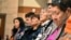 FILE - Elders from the Northern Cheyenne Tribe in Montana listen to speakers during a session for survivors of government-sponsored Native American boarding schools, in Bozeman, Montana, Nov. 5, 2023.