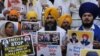 Activists of the Dal Khalsa Sikh organisation, a pro-Khalistan group, stage a demonstration demanding justice for Sikh separatist Hardeep Singh Nijjar, who was killed in June 2023 near Vancouver, after offering prayers at the at Akal Takht Sahib in the Go