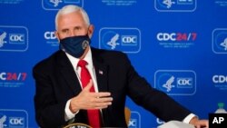 Vice President Mike Pence speaks during a briefing on COVID-19 at the Centers for Disease Control and Prevention in Atlanta, Dec. 4, 2020.