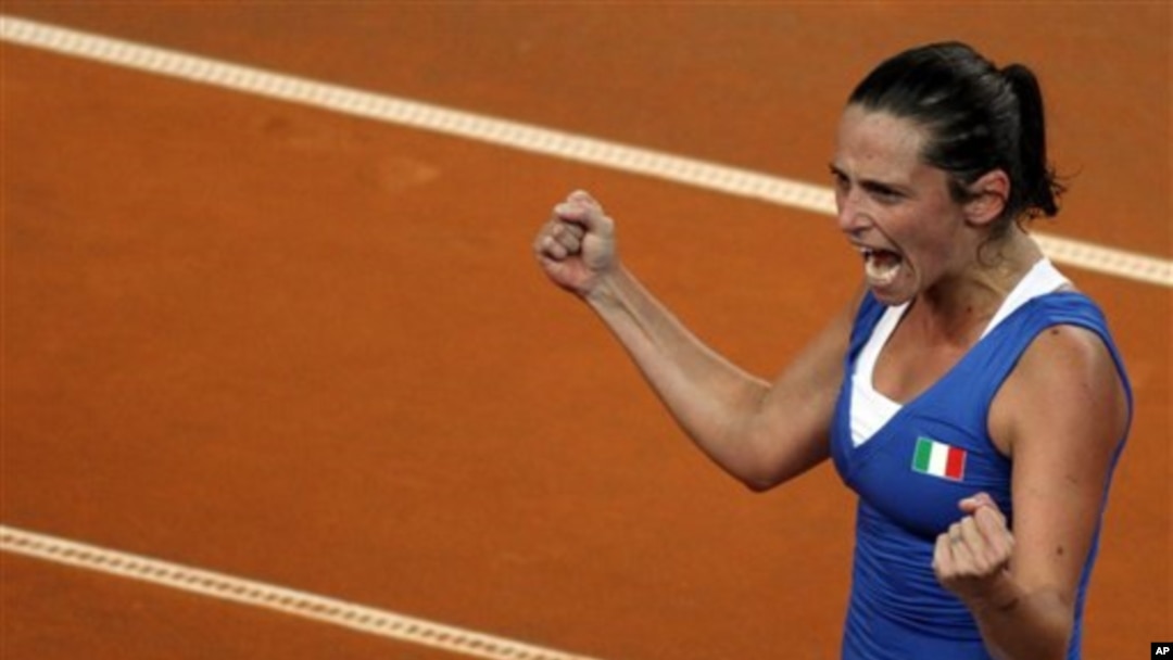 Roberta Vinci berteriak senang setelah mengalahkan Samantha Stosur 6-2, 6-4 (foto: Dok).