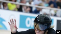 New Zealand's Olivia Podmore waves after competing at the Women's Sprint 1/8 finals at the Anna Meares Velodrome during the 2018 Commonwealth Games in Brisbane, Australia, April 6, 2018. 