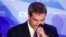 Bavarian governor Markus Soeder reacts during his first appearance after the first exit polls for the Bavarian state election in Munich, southern Germany, Sunday, Oct. 14, 2018. 