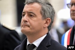 FILE—France's Minister for Interior and Overseas Gerald Darmanin attends a tribute to a late police officer, on the Champs-Elysees avenue in Paris on April 19, 2024.