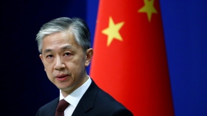 Phát ngôn viên Bộ Ngoại giao Trung quốc Uông Văn Bân tại một cuộc họp báo ở Bắc Kinh. (Reuters)
