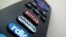 The Amazon TV button on a remote control is shown in this photo illustration, Nov. 10, 2017 
