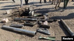 Shell casings lie at the site of a U.S. airstrike in al-Qaim, Iraq, on Feb. 3, 2024.