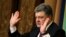 FILE - Ukraine's President Petro Poroshenko, shown at a news conference at the Japan National Press Club in Tokyo in April, seeks reassurance of continued U.S. support against Russia. 