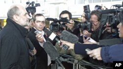 Herman Nackaerts (L), deputy director general of the International Atomic Energy Agency [IAEA] who headed the six-member IAEA mission to Iran, talks to journalists on his arrival from Tehran at the international airport in Vienna, February 1, 2012.