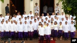 The Cambodia National Rescue Party lawmakers attended a swearing in ceremony in traditional dress at the Royal Palace, in front of King Norodom Sihamoni.