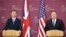 U.S. Secretary of State Mike Pompeo, right, and Britain's Foreign Secretary Jeremy Hunt speak at a joint press conference at the Foreign Office in London, May 8, 2019.