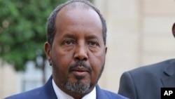 FILE - Somalia President Hassan Sheikh Mohamud addresses the media following his meeting with French President Francois Hollande at the Elysee Palace in Paris.