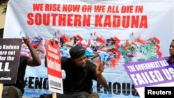 FILE -: People gather to protest the incessant killings in southern Kaduna and insecurities in Nigeria, at the U.S. embassy in Abuja, Nigeria, August 15, 2020.