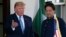 President Donald Trump gestures as he greets Pakistan's Prime Minister Imran Khan as he arrives at the White House, Monday, July 22, 2019, in Washington.