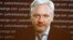 FILE - WikiLeaks founder Julian Assange appears via video link at a news conference in London, Feb. 5, 2016. A Swedish appeals court has upheld a warrant for his arrest.