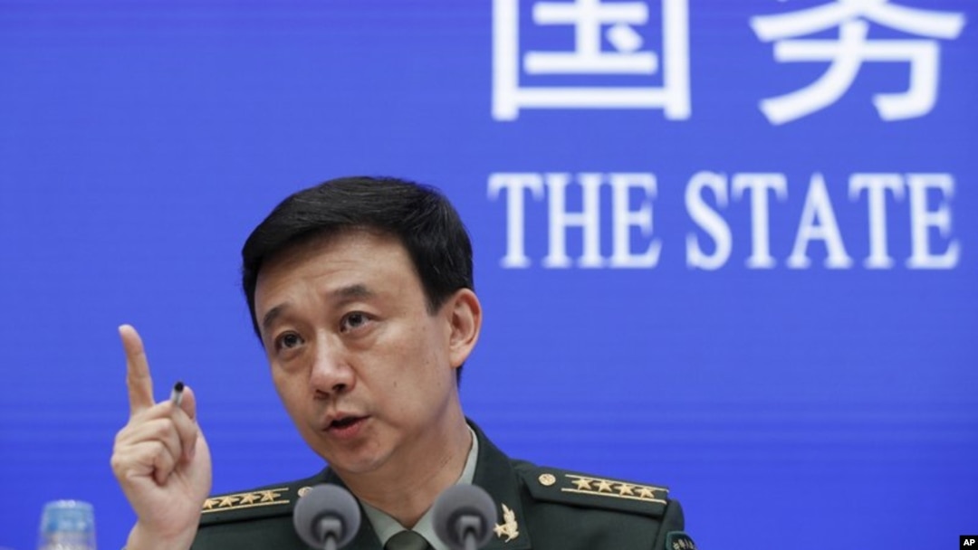 中国国防部发言人吴谦在北京中国国务院举行的记者会上（2019年7月24日）