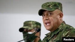The commander of the Colombian Military Forces, Gen. Luis Fernando Navarro, speaks during a news conference about the alleged participation of several Colombians in the assassination of Haitian President Jovenel Moise, in Bogota, July 9, 2021. 