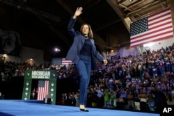 Democratic presidential nominee Vice President Kamala Harris arrives to speak during a campaign rally at Jenison Field House on the campus of Michigan State University, Sunday, Nov. 3, 2024, in East Lansing, Mich. (AP Photo/Jacquelyn Martin)