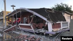 Sebuah rumah yang rusak berat akibat gempa yang mengguncang Guanica, Puerto Rico, 7 Januari 2020. 