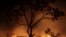 A fire burns in the Chapada dos Veadeiros National Park in Goias state, Brazil, Oct. 28, 2017. 