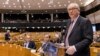 EU Commission President Jean Claude Juncker, left, addresses Members of European Parliament on Brexit during a plenary session at the European Parliament in Brussels on Jan. 30, 2019. 