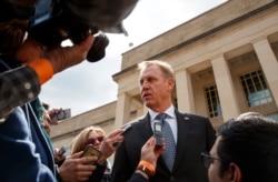 Acting Defense Secretary Patrick Shanahan talks to the media before the arrival of French Defense Minister Florence Parly at the Pentagon, March 18, 2019.