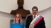 Venezuelan President Nicolas Maduro and his wife, Cilia Flores, react at his inauguration for a third six-year term, in Caracas on Jan. 10, 2025. On the day of his inauguration, the U.S. increased to $25 million the reward it is offering for Maduro's arrest.