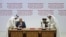 U.S. Special Representative for Afghanistan Reconciliation Zalmay Khalilzad and Taliban deputy chief for political affairs Mullah Abdul Ghani Baradar sign the U.S.-Taliban peace agreement during a ceremony in the Qatari capital Doha, Feb. 29, 2020.