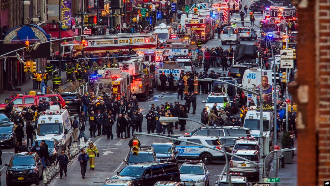 Law enforcement officials work following an explosion near New York's Times Square, Dec. 11, 2017.