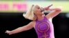 FILE - In this Sunday, March 8, 2020, file photo, Katy Perry performs before the start of the Women's T20 World Cup cricket final match between Australia and India in Melbourne. A federal judge has given Perry a major victory in the dispute over her…