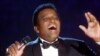 FILE - Charley Pride performs during his induction into the Country Music Hall of Fame at the Country Music Association Awards show at the Grand Ole Opry House in Nashville, Tenn., Oct. 4, 2000.