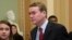 FILE - Sen. Michael Bennet, D-Colo., leaves the chamber at the Capitol in Washington on Jan. 24, 2019.