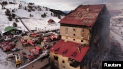 A drone view shows a fire at a hotel in the ski resort of Kartalkaya in Bolu province, Turkey, Jan. 21, 2025.