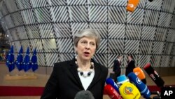 La Première ministre britannique, Theresa May, à Bruxelles le vendredi 23 mars 2018. (AP Photo / Virginia Mayo)