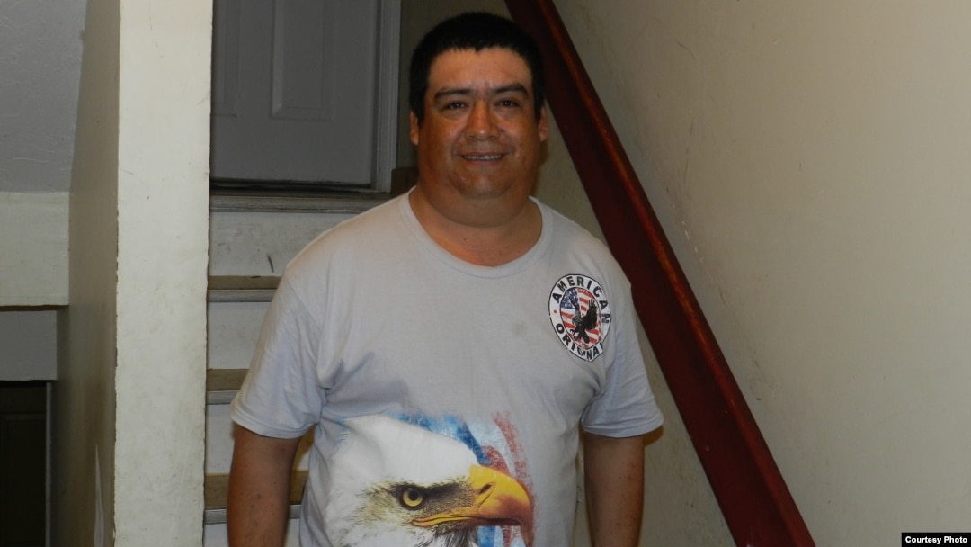 Guillermo Peralta, shown standing at the entrance to his Pennsylvania apartment building, has had his deportation proceedings overturned by an immigration court judge. (Photo courtesy of Mike Kornely)