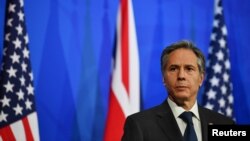 U.S. Secretary of State Antony Blinken attends a joint news conference following a bilateral meeting with Britain's Foreign Secretary Dominic Raab in London, May 3, 2021, during the G7 foreign ministers meeting.
